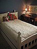 My husband built this bed for our daughter but at 5'8" she's outgrown it so we swapped it with the full-size bed that used to be